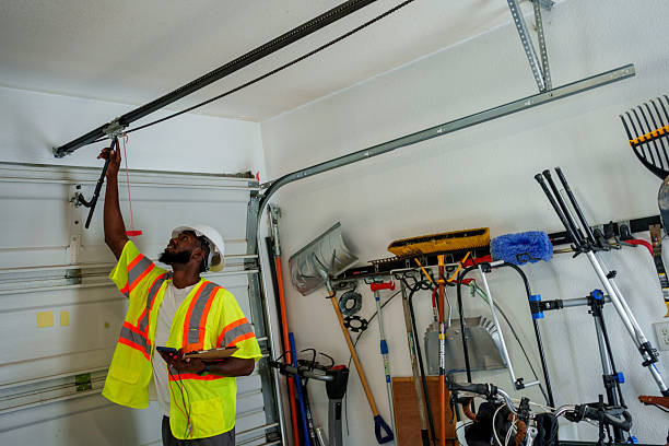 Professional Garage Door Panel Replacement technician working in Fort Drum, NY